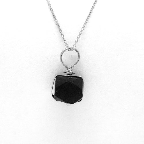Front View: Jet Azabache Pendant 6mm Size Framed in 14k White Gold