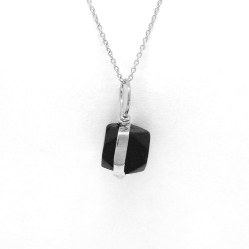 Side View: Jet Azabache Pendant 6mm Size Framed in Sterling Silver