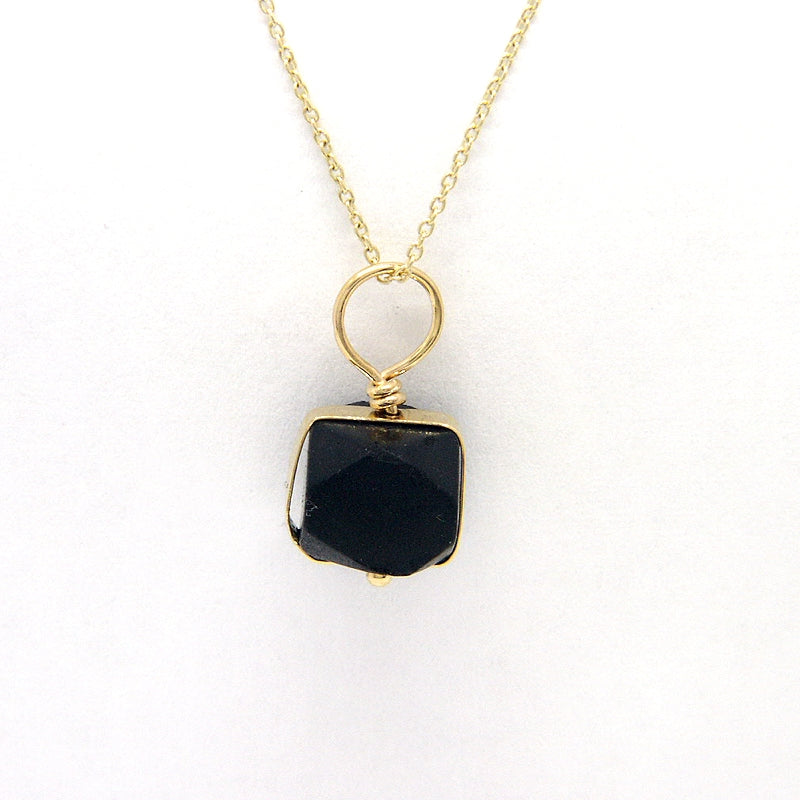 Front View: Jet Azabache Pendant 6mm Size Framed in Gold Over Sterling Silver