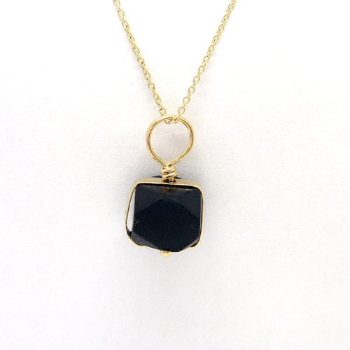 Front View: Jet Azabache Pendant 6mm Size Framed in Gold Over Sterling Silver