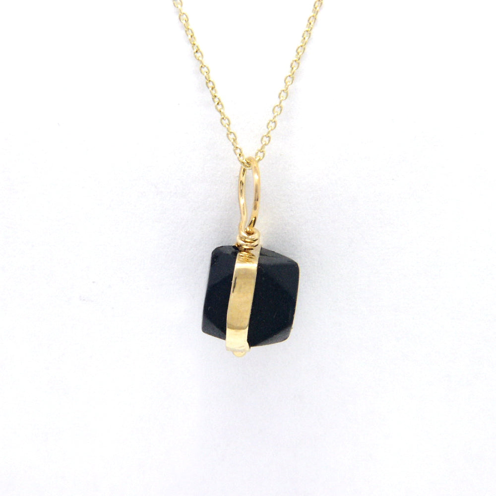 Side View: Jet Azabache Pendant 6mm Size Framed in Gold Over Sterling Silver