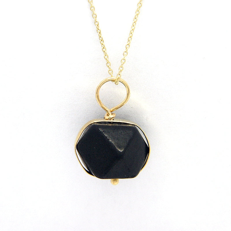 Front View: Jet Azabache Pendant 9mm Size Framed in 14k Yellow Gold