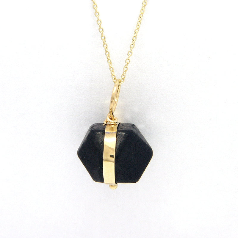 Side View: Jet Azabache Pendant 9mm Size Framed in 14k Yellow Gold